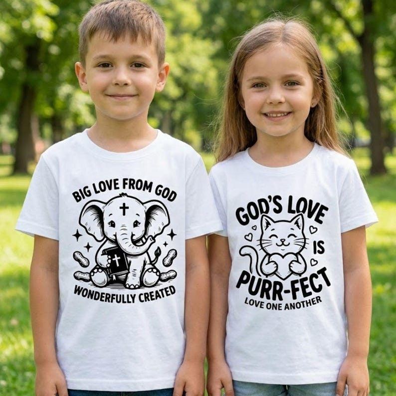 May include: Two children wearing white t-shirts with graphic designs. One shirt features an elephant holding a book with the text "BIG LOVE FROM GOD WONDERFULLY CREATED." The other shirt has a cat holding a heart with the text "GOD'S LOVE IS PURR-FECT LOVE ONE ANOTHER."