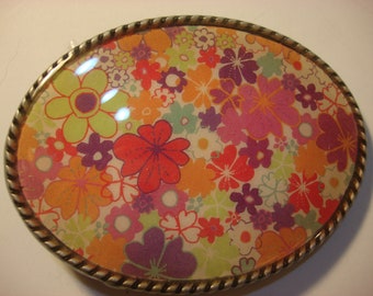 Jada Belt Buckle - Flower Carpet - Oval Wearable Art