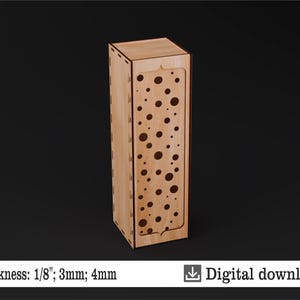 May include: A laser cut wooden box with a polka dot pattern. The box is 1/8 inch thick and is available in 3mm and 4mm thicknesses. The box is a digital download and comes in SVG, DXF, CDR, PDF, and AI formats.