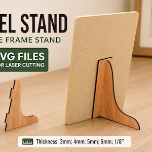 May include: Wooden easel stand for picture frames. The image shows a light brown picture frame stand with a wooden support. The text on the image says "EASEL STAND PICTURE FRAME STAND SVG FILES FOR LASER CUTTING". The thickness is 1/8 inch.