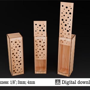 May include: Three wooden boxes with a dotted pattern cut out. The boxes are 1/8 inch, 3 mm, and 4 mm thick. The boxes are for digital download in SVG, DXF, CDR, PDF, and AI formats.