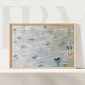 May include: A framed art print featuring numerous sailboats floating on a light blue sea. The boats are painted in various colors, including white, yellow, and pink, with a light wooden frame. The artwork evokes a serene, nautical theme.