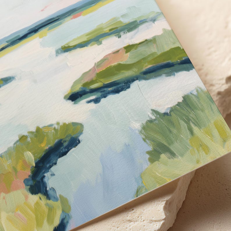 May include: An abstract landscape painting with a palette of blues, greens, and white. The artwork features brushstrokes suggesting water, land, and sky. The painting is on a square canvas, with a textured surface.