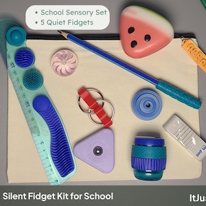 May include: A school sensory set containing 5 quiet fidgets on a canvas pouch. Items include a 20 cm ruler with textured blue silicone, a watermelon-shaped stress toy, a blue pencil, a pink swirl, a red ring, a purple triangle, and a blue cup.