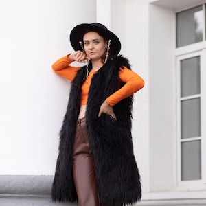 Black shaggy vest store