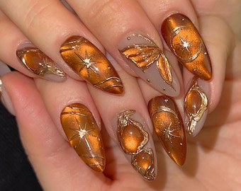Amber Acrylic Nails | Brown Butterfly Gel Nails | Gold Metallic Nails with 3D Design | Vintage Caramel Nails | Fall Aesthetic False Nails