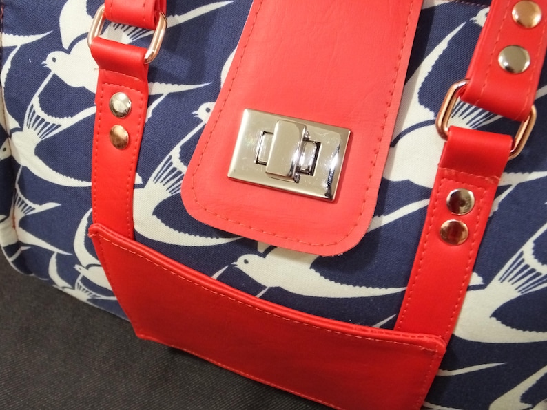 copper and silver hardware and turn clasp closure American Bluebird Nora Doctor Bag structured purse with red vinyl handles