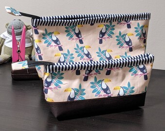 Pair of pink Flamingo Lola Pouches that open wide, zipper pouch, organization