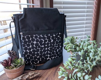 Irregular Dots Coneflower Crossbody Bag black with nickel hardware with two main compartments and two zipper pockets