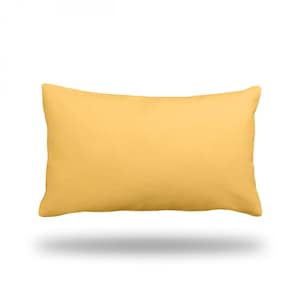 Puede incluir: Un cojín amarillo con un tejido suave y texturizado.