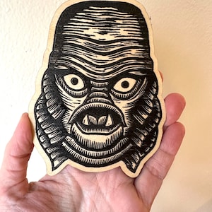 Ein Wesen aus dem Black Lagoon Monster Holz Magnet