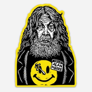 May include: Black and white illustration of a man with long hair and a beard. He is wearing a black shirt with a yellow smiley face and a name tag that says "Hello Alan Moore".