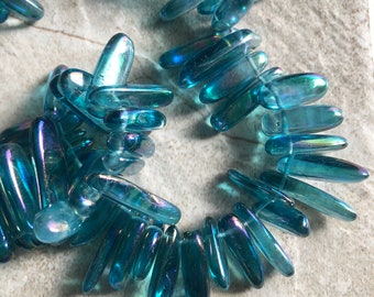 1 Strand of Iridescent Aqua Blue Glass Stick beads approx 10-20mm