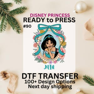 May include: A DTF transfer featuring a Disney Princess design. The image showcases Princess Jasmine, framed by a teal ribbon and floral accents. Text includes "DISNEY PRINCESS READY to PRESS #90 MIA" and "DTF TRANSFER 100+ Design Options".