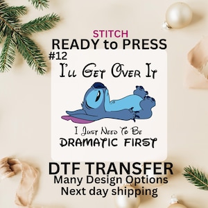 May include: A white iron-on transfer design featuring Stitch from Lilo & Stitch. The design says "I'll Get Over It I Just Need To Be Dramatic First".