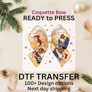May include: A ready-to-press heat transfer design featuring a yellow and gold bow with a glitter finish. The bow has images of Belle and the Beast from the Disney movie Beauty and the Beast. The text "Coquette Bow READY to PRESS" is at the top of the design. The text "DTF TRANSFER 100+ Design options Next day shipping" is at the bottom of the design.