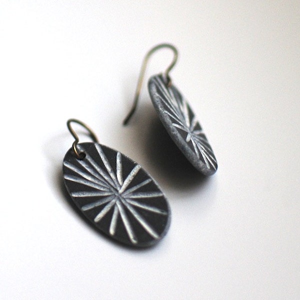 Star brass dangle earrings