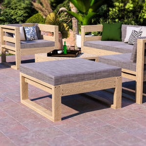 May include: Outdoor patio furniture set with light wood frames and gray cushions. The set includes a sofa, two armchairs, and a square ottoman. A small side table with a black frame and a green plant is also present.