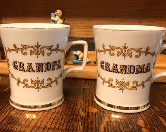 set of Grandma and Grandpa coffee mugs. gold lettering. Knobler.  made in japan.