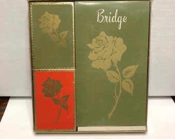 bridge set. two decks with a rose two score pads. Royal Party Pak. Heines publishing. green and red