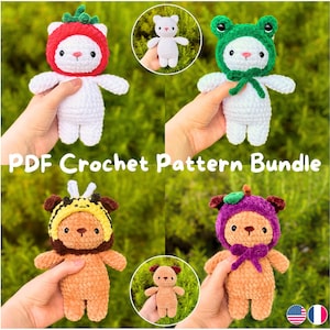 May include: A collection of four crochet animal dolls, each with a unique hat: a strawberry, a frog, a bee, and a plum. The dolls are white and tan, with the text "PDF Crochet Pattern Bundle" in the center. The background is green.