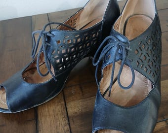 Black womans black leather open toe dressy tie shoe
