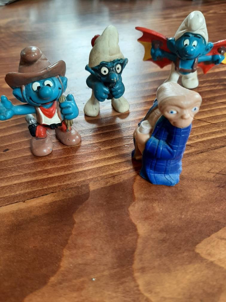 Three vintage smurf rubber figurines , ET figurine toy, Donald Duck rubber  figurine.