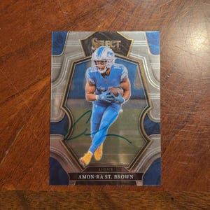Amon Ra St Brown signierte Karte Panini Auswahl Football Professional Level Karte Detroit Lions Handsignierte Karte ohne COA