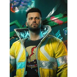 May include: A person with short dark hair and facial implants wears a bright yellow jacket with silver accents over a black t-shirt featuring a graphic of a cracked sphere. A large green and pink rifle rests across their shoulders.