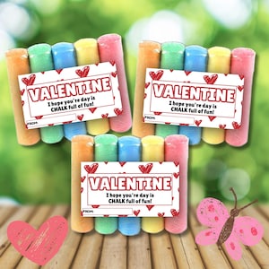 May include: Three sets of colorful chalk sticks, each with a Valentine's Day card that reads "VALENTINE, I hope you're day is CHALK full of fun!" The chalk is in shades of pink, yellow, blue, green, and orange. A pink heart and butterfly are also in the image.