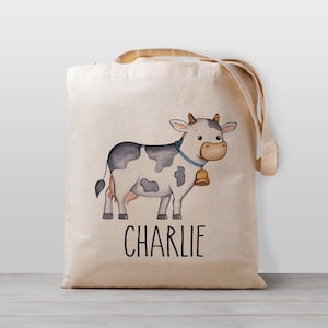 Sac fourre-tout personnalisé pour enfant, vache avec nom Nom pour garçon, fille ou genre neutre, école de toile, sac préscolaire ou garderie