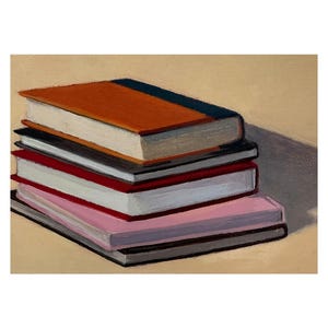 May include: A stack of five books with colorful covers. The top book has an orange cover with a dark blue spine. The other books have black, red, and pink covers. The books are stacked on a light beige surface.