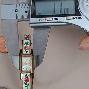 Vintage Consul Manual Gold Tone Watch White with Red Flower Enamel Working image 6
