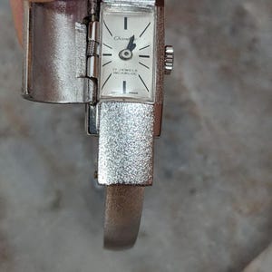Vintage Chandler Silver Tone Peek a boo Watch Green Enamel Star White Gem Accent image 4