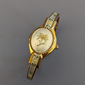 Vintage Andre Mouche Gold Tone Bangle Watch Enamel Floral Design Concealed Dial