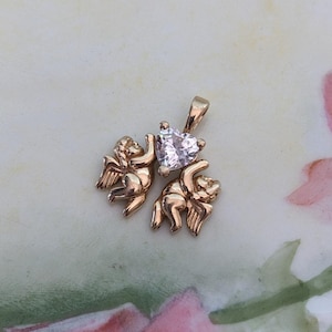 Vintage 14k Yellow Gold Cherubs Holding CZ Heart Pendant