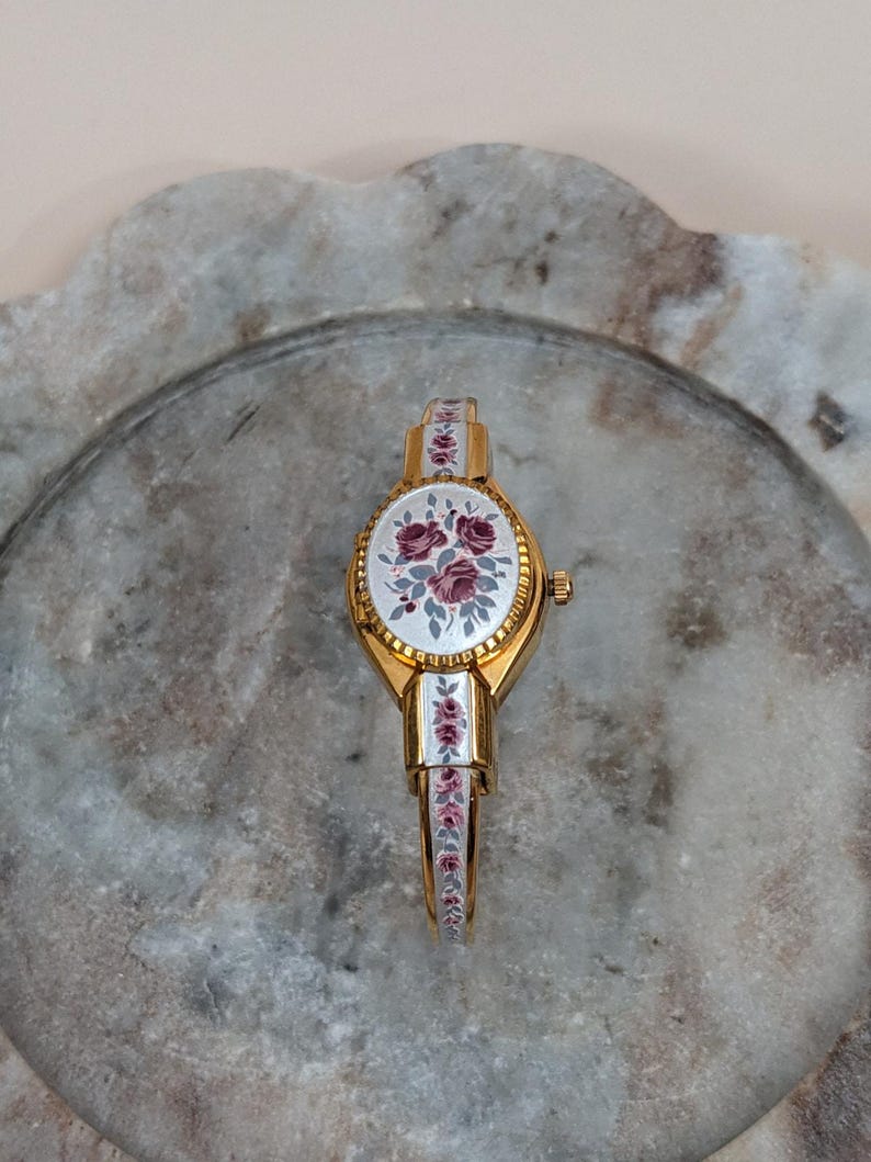 Vintage Andre Mouche Gold Tone Peekaboo Watch Grey Enamel Purple Flowers image 1