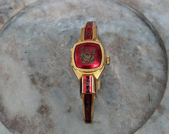 Vintage Samba Gold Tone Peek a boo Watch Bright Red Enamel Flower Accents
