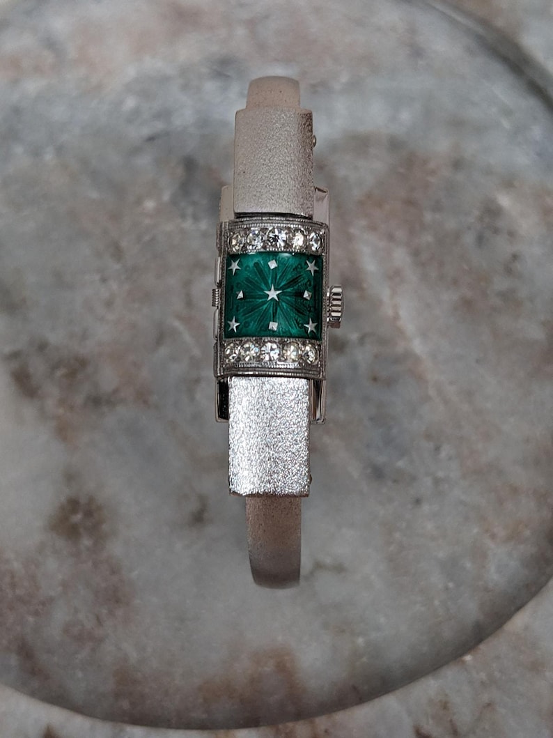 Vintage Chandler Silver Tone Peek a boo Watch Green Enamel Star White Gem Accent image 1