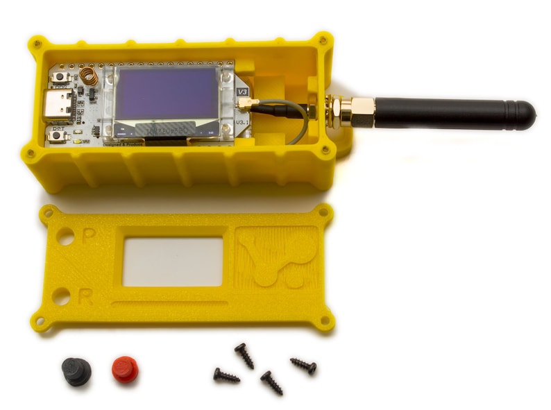May include: A yellow plastic case with a black antenna, a small screen, and a circuit board inside. The case is open and the top half is lying next to the bottom half. There are four black screws and two small buttons, one black and one red, on a white background.