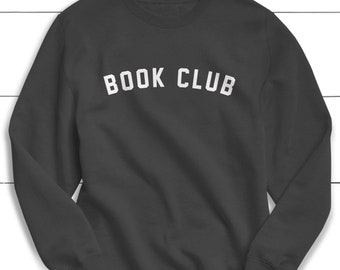 Puede incluir: Una sudadera gris oscuro con el texto "BOOK CLUB" impreso en blanco en la parte delantera.