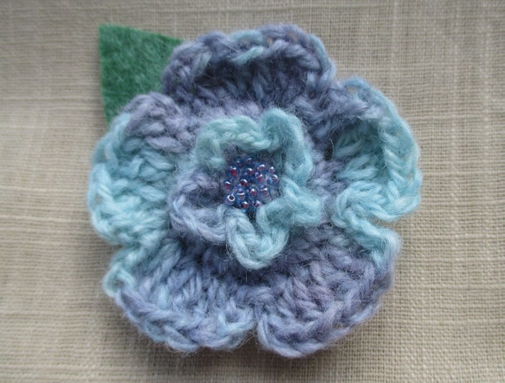 Crocheted woollen flower corsage brooch
