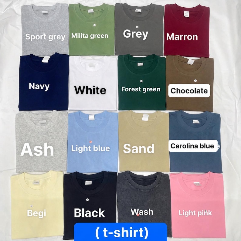Peut inclure: Une collection de seize t-shirts &agrave; manches courtes et col rond dans diverses couleurs unies, notamment gris sport, vert militaire, gris, marron, marine, blanc, vert for&ecirc;t, chocolat, cendre, bleu clair, sable, bleu caroline, beige, noir, d&eacute;lav&eacute; et rose clair.