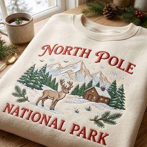 Vintage sweatshirt met geborduurde Noordpoolprint, trui met ronde hals en rendiermotief uit het nationale park, rustieke kersttrui voor in een blokhut.