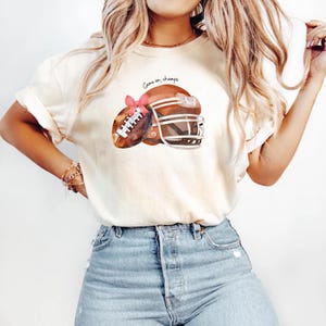 Comfort Colors® Unisex Football Mom T-Shirt with Custom Coquette Mascot Bow, Cheer Mascot School Spirit Tee, Team Game Day Shirt Fan Edition