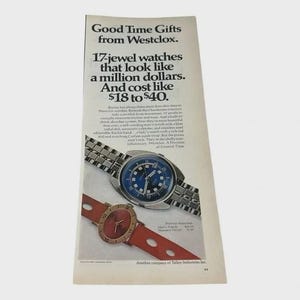 May include: An advertisement for Westclox watches. The ad features two watches: one with a blue dial and silver band, and another with a red dial and red strap. Text reads "Good Time Gifts from Westclox."