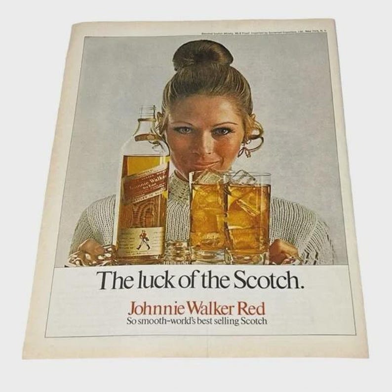 May include: Vintage advertisement featuring a woman holding a bottle of Johnnie Walker Red Scotch and two glasses of the drink with ice. The text reads "The luck of the Scotch." and "So smooth-world's best selling Scotch."