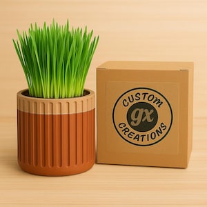 May include: A white ceramic mug with a black handle and the text "But First, Coffee" in a handwritten style. The mug is on a white surface. The mug is 4 inches tall.