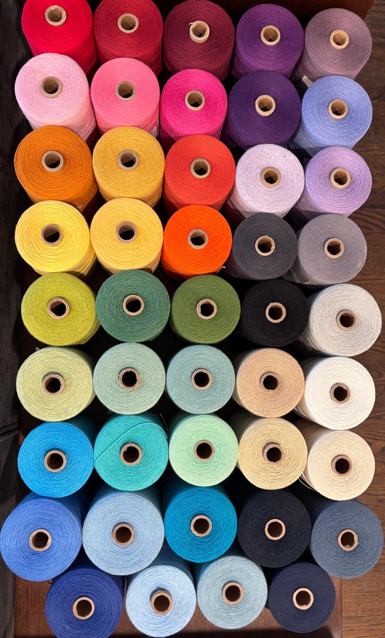 Maurice Brassard 8/2 cotton weaving yarn cones in 81 colors used for floor looms, rigid heddle, tapestry, knitting machines.