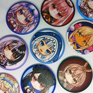 May include: A collection of colorful, round anime-style character buttons. Each button features a different character with large eyes and detailed hair, set against various background colors. The buttons are arranged closely together.
